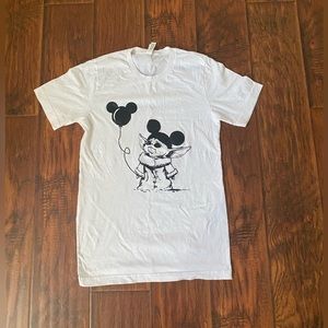 Baby Yoda with a mickey mouse balloon Disney  T-shirt